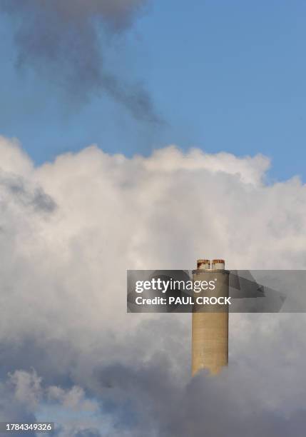 Australia-Environment-Climate An exhaust stack rises through the steam of the Loy Yang B power station in the Latrobe Valley, 150km east of Melbourne...