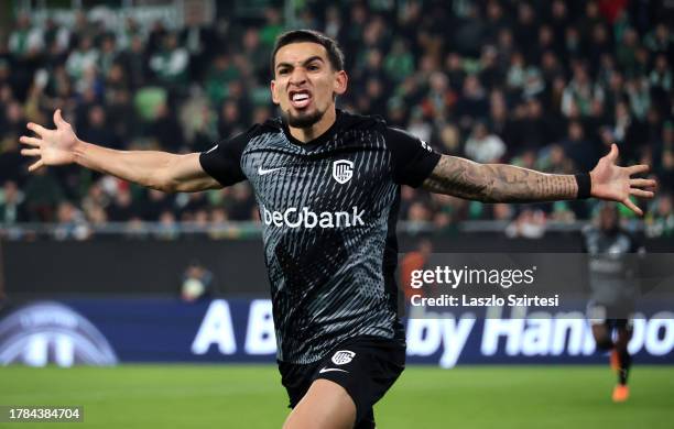 Daniel Munoz of KRC Genk celebrates after scoring the team's first goal during the UEFA Europa Conference League 2023/24 match between Ferencvarosi...