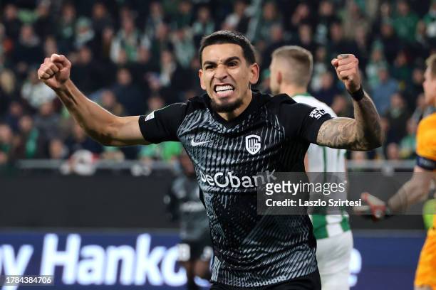 Daniel Munoz of KRC Genk celebrates after scoring the team's first goal during the UEFA Europa Conference League 2023/24 match between Ferencvarosi...