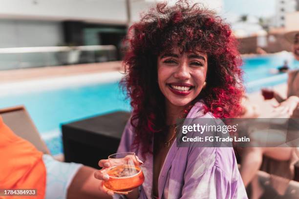 portrait of a young woman relaxing at hotel - dyed hair stock pictures, royalty-free photos & images