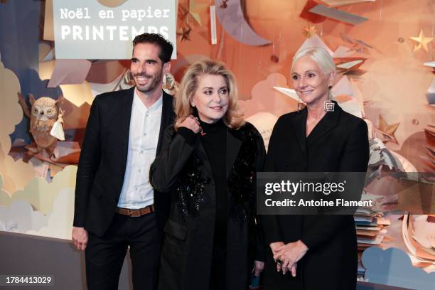 Le Printemps chief marketing Stephane Roth, Catherine Deneuve and Le Printemps Haussmann managing director Laurence Nicolas attend the 'Noel en...