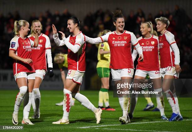 Lotte Wubben-Moy of Arsenal celebrates with teammates after scoring the team's second goal during the FA Women's Continental Tyres League Cup match...