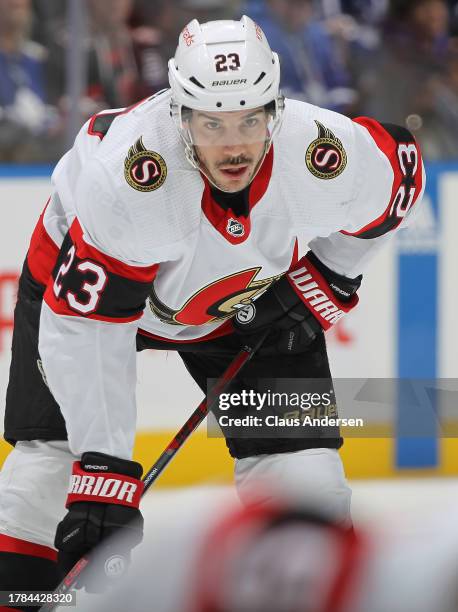 Travis Hamonic of the Ottawa Senators waits for a faceoff against the Toronto Maple Leafs during the first period of an NHL game at Scotiabank Arena...