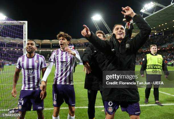 Vincent Sierro, Cristian Casseres Jr and Cesar Gelabert of Toulouse celebrate following the team's victory in the UEFA Europa League 2023/24 match...