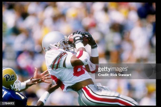 Flanker Terry Glenn of the Ohio State Buckeyes makes a catch during a game against the Pittsburgh Panthers at Pitt Stadium in Pittsburgh,...