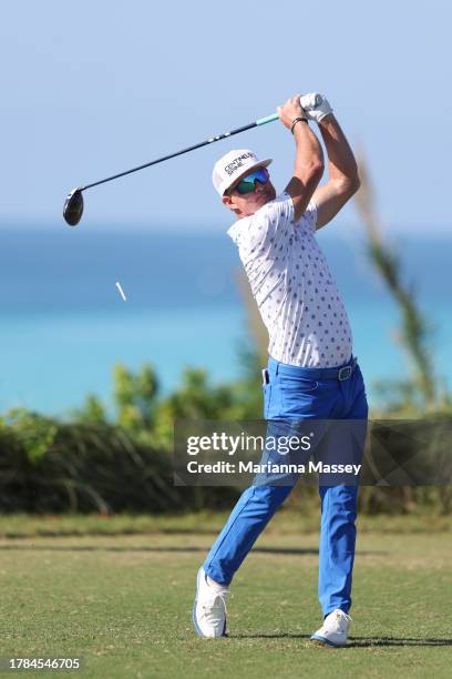 Brian Gay of the United States hits a tee shot on the ninth hole during the first round of the Butterfield Bermuda Championship at Port Royal Golf...