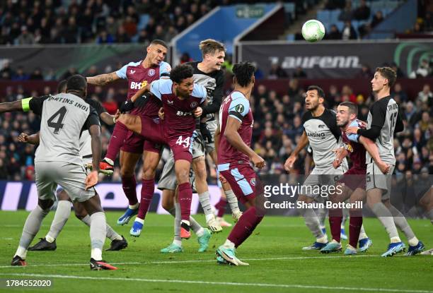 Diego Carlos of Aston Villa heads the ball and scores the team's first goal during the UEFA Europa Conference League 2023/24 group stage match...