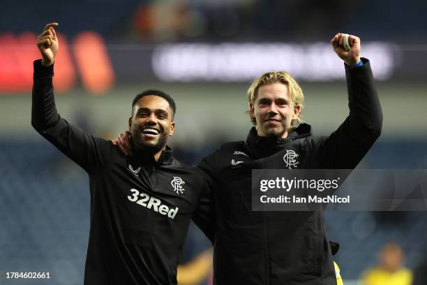 Danilo and Todd Cantwell of Rangers celebrate following the team's victory in the UEFA Europa League 2023/24 match between Rangers FC and AC Sparta...