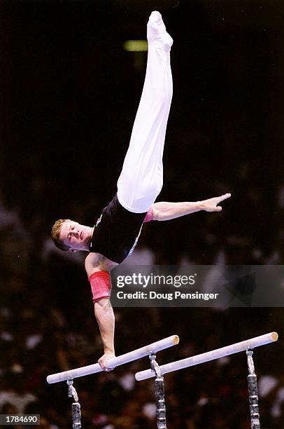 Alexei Nemov of Russia performs in an event of the men''s individual all-around competition in the Summer Olympics at the Georgia Dome in Atlanta,...