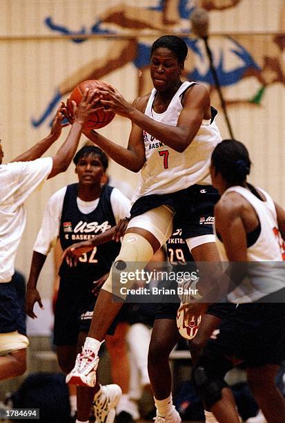 Taj McWilliams jumps into the air with the ball at the United States women''s basketball team national trials at the USOC training center in Colorado...