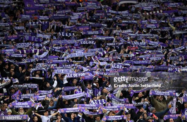 Toulouse fans hold up scarves during the Group E - UEFA Europa League match 2023/24 match between Toulouse FC v Liverpool FC at Stadium de Toulouse...
