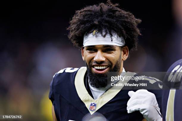 Chris Olave of the New Orleans Saints on the sidelines during a game against the Chicago Bears at Caesars Superdome on November 5, 2023 in New...