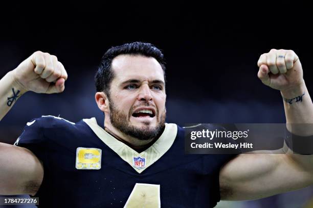 Derek Carr of the New Orleans Saints celebrates on the sidelines during a game against the Chicago Bears at Caesars Superdome on November 5, 2023 in...