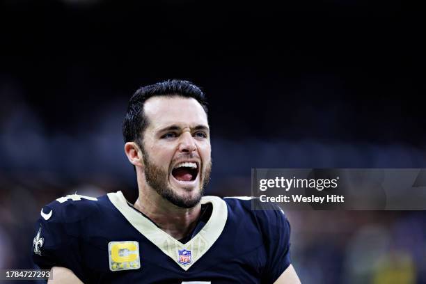 Derek Carr of the New Orleans Saints celebrates on the sidelines during a game against the Chicago Bears at Caesars Superdome on November 5, 2023 in...