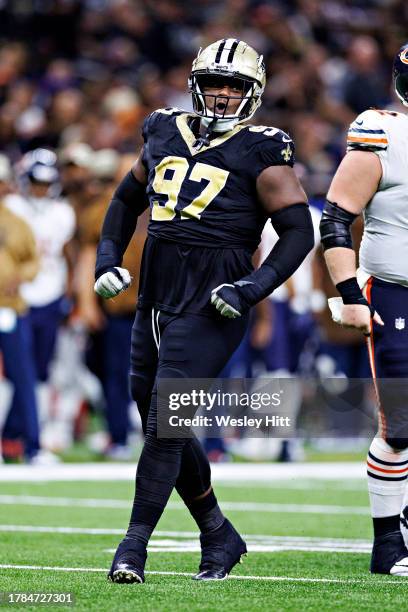 Malcolm Roach of the New Orleans Saints celebrates after a tackle during a game against the Chicago Bears at Caesars Superdome on November 5, 2023 in...