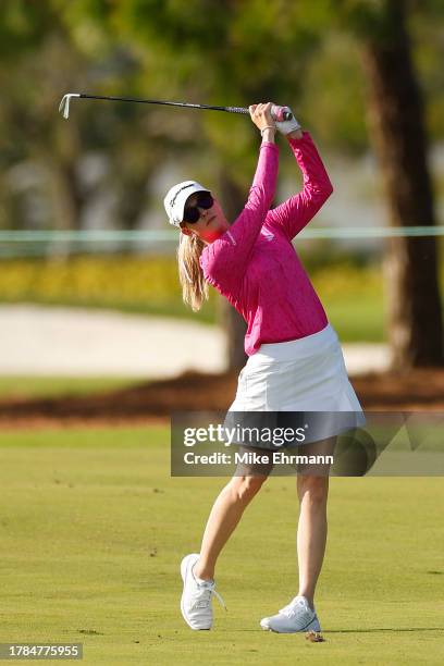 Paula Creamer of the United States plays an approach shot on the 13th hole during the first round of The ANNIKA driven by Gainbridge at Pelican at...