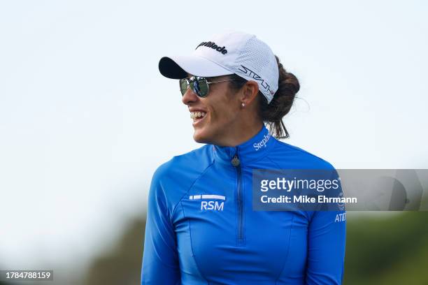 Maria Fassi of Mexico smiles after hitting an approach shot on the 13th hole during the first round of The ANNIKA driven by Gainbridge at Pelican at...