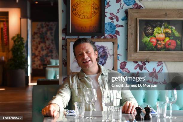 British chef Jamie Oliver poses for a photo before an exclusive brunch at Jamie's Italian onboard Royal Caribbean's Ovation of the Seas on November...