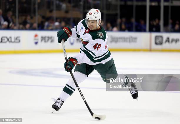 Daemon Hunt of the Minnesota Wild takes a shot on goal during the first period against the New York Rangers at Madison Square Garden on November 09,...