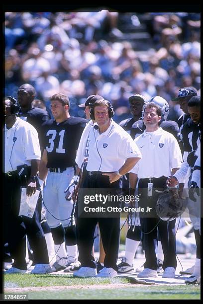 Head coach Joe Bugel of the Oakland Raiders looks on during a preseason game against the New Orleans Saints at the Oakland-Alameda County Coliseum in...