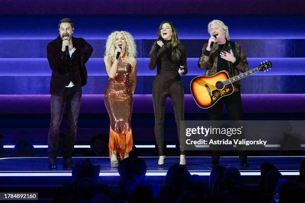 Jimi Westbrook, Kimberly Schlapman, Karen Fairchild and Phillip Sweet of Little Big Town perform onstage during the 57th Annual CMA Awards at...