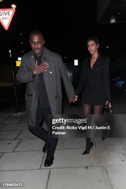 Idris Elba and Sabrina Dhowre Elba are seen leaving Diddy's birthday party at LAVO on November 09, 2023 in London, England.