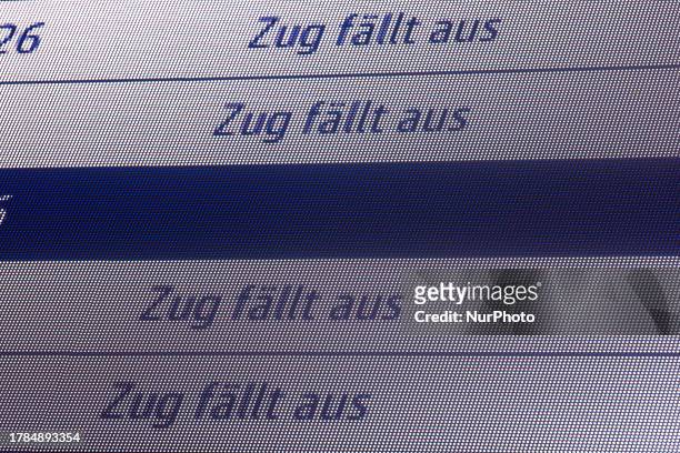 Departure information screen is displayed bahn canncelling signs at Cologne central station, in Cologne, Germany on Nov.15.2023 as GDL labor union...