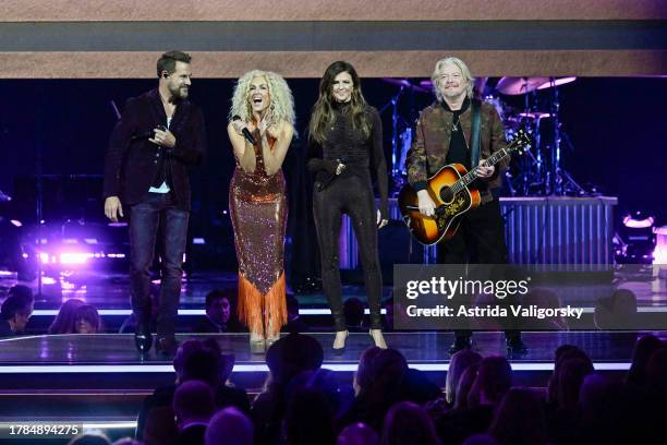 Jimi Westbrook, Kimberly Schlapman, Karen Fairchild and Phillip Sweet of Little Big Town perform onstage during the 57th Annual CMA Awards at...