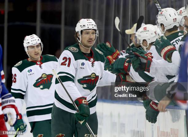 Brandon Duhaime of the Minnesota Wild celebrates his goal with teammates on the bench in the second period against the New York Rangers at Madison...