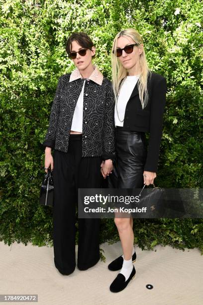 Kristen Stewart, wearing CHANEL, and Dylan Meyer attend the Academy Women's Luncheon Presented By CHANEL at the Academy Museum of Motion Pictures on...