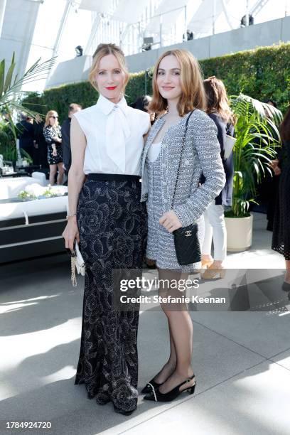 Leslie Mann and Maude Apatow, both wearing CHANEL, attend the Academy Women's Luncheon Presented By CHANEL at the Academy Museum of Motion Pictures...