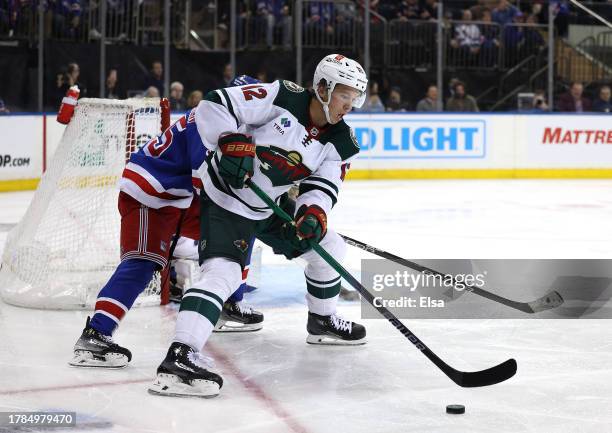 Matt Boldy of the Minnesota Wild wraps round the net during the third period against the New York Rangers at Madison Square Garden on November 09,...