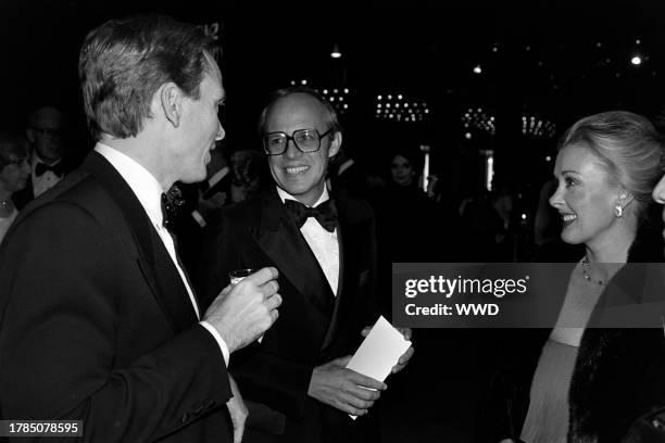 Bob Mackie, John Dean, and Maureen Dean attend a benefit event, presented by the Women's Guild of Cedars-Sinai, in Los Angeles, California, on...