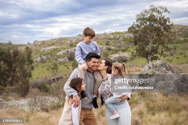 big family touring allotment to build their new home - family with three children stock pictures, royalty-free photos & images