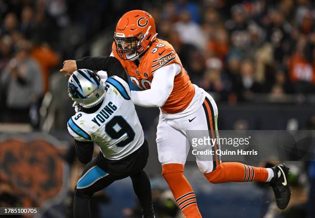 Montez Sweat of the Chicago Bears hits Bryce Young of the Carolina Panthers during the first half at Soldier Field on November 09, 2023 in Chicago,...