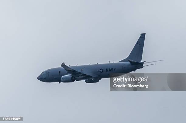 Navy P-8 Poseidon aircraft flies over areas of the Second Thomas Shoal in the South China Sea, on Friday, Nov. 10, 2023. The latest mission to...