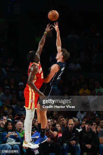 Franz Wagner of the Orlando Magic goes up for a layup against Clint Capela of the Atlanta Hawks during the game between the Atlanta Hawks and Orlando...