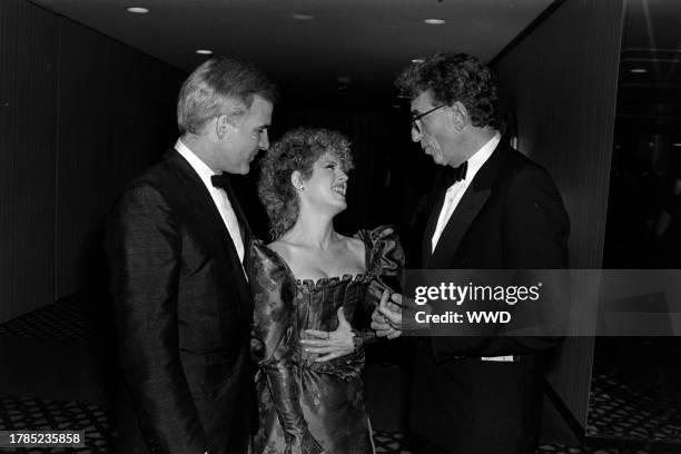 Steve Martin, Bernadette Peters, and Herbert Ross attend a benefit event, presented by the Women's Guild of Cedars-Sinai, in Los Angeles, California,...