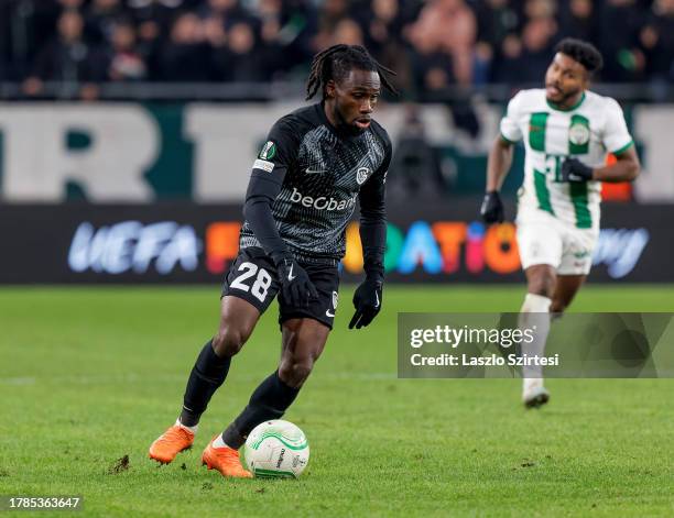 Joseph Paintsil of KRC Genk controls the ball during the UEFA Europa Conference League Group Stage match between Ferencvarosi TC and KRC Genk at...