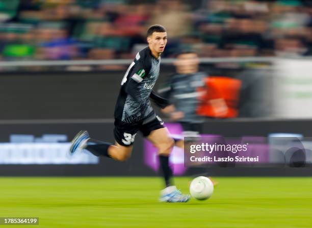 Bilal El Khannous of KRC Genk runs with the ball during the UEFA Europa Conference League Group Stage match between Ferencvarosi TC and KRC Genk at...