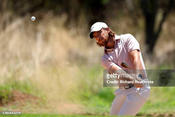 Tommy Fleetwood of England plays out of a bunker on the 14th hole during Day Two of the Nedbank Golf Challenge at Gary Player CC on November 10, 2023...