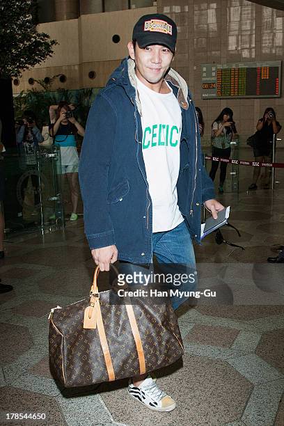 Kangin of South Korean boy band Super Junior is seen on departure at Gimpo International Airport on August 30, 2013 in Seoul, South Korea.