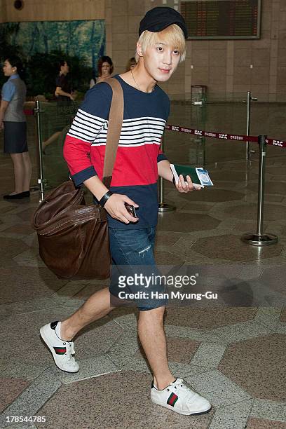 Sungmo of South Korean boy band Choshinsung is seen on departure at Gimpo International Airport on August 30, 2013 in Seoul, South Korea.