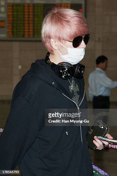 Sungje of South Korean boy band Choshinsung is seen on departure at Gimpo International Airport on August 30, 2013 in Seoul, South Korea.