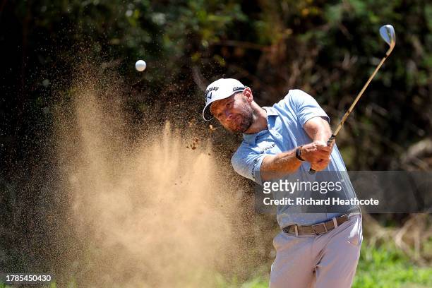 Maximilian Kieffer of Germany plays out of a bunker on the 14th hole during Day Two of the Nedbank Golf Challenge at Gary Player CC on November 10,...