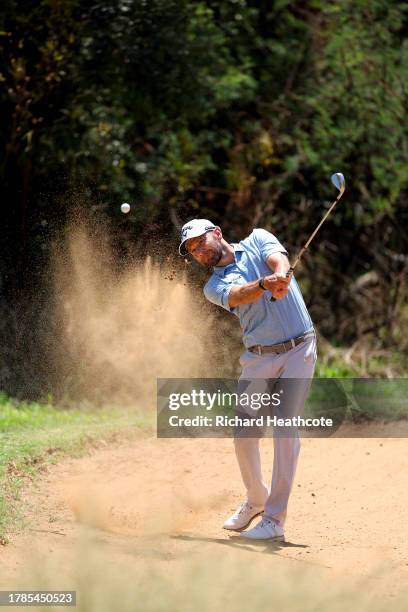 Maximilian Kieffer of Germany plays out of a bunker on the 14th hole during Day Two of the Nedbank Golf Challenge at Gary Player CC on November 10,...