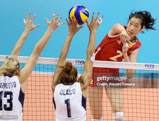 Ting Zhu of China spikes the ball during day three of the FIVB World Grand Prix Sapporo 2013 match between China and USA at Hokkaido Prefectural...