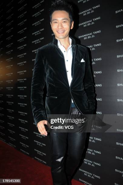 Actor Huang Xiaoming attends Shanghai Tang store opening ceremony at Cathay Theater on August 29, 2013 in Shanghai, China.