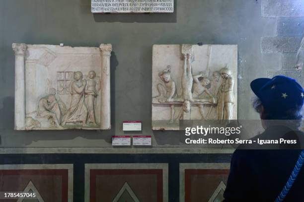 Visitors admire the italian Renaissance artist, sculptor and ceramist Luca Della Robbia at Bargello Museum site where is unveiled the "Madonna with...