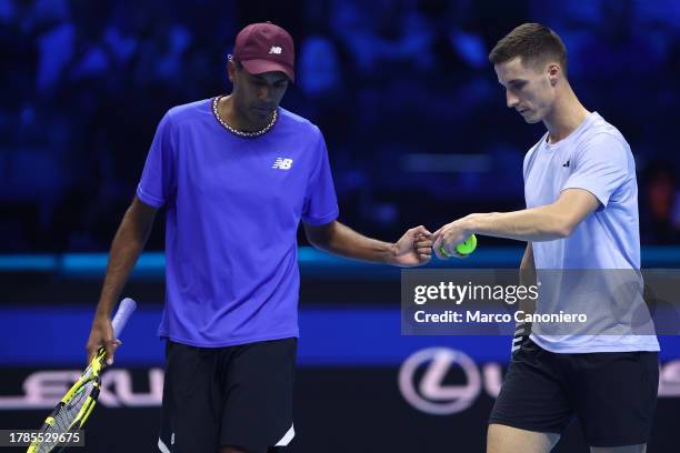 Joe Salisbury of Great Britain and Rajeev Ram of USA celebrate during the Round Robin double match between Wesley Koolhof of Holland and Neal Skupski...